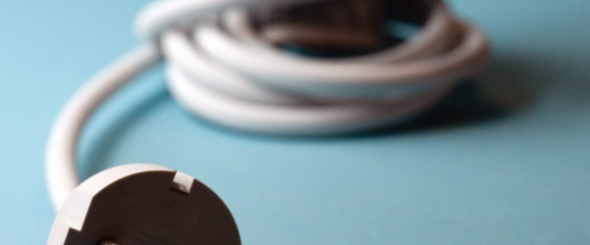 electric-plug-and-dollar-bills-on-blue-background-2025-03-07-13-37-06-utc