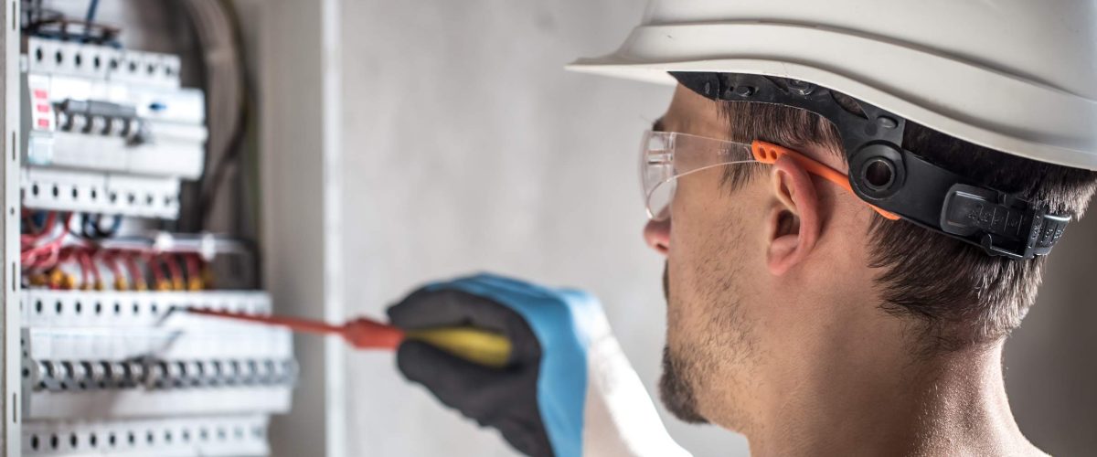 man-an-electrical-technician-working-in-a-switchb-2025-03-14-05-45-56-utc